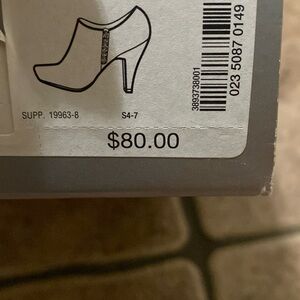 New, never worn black booties